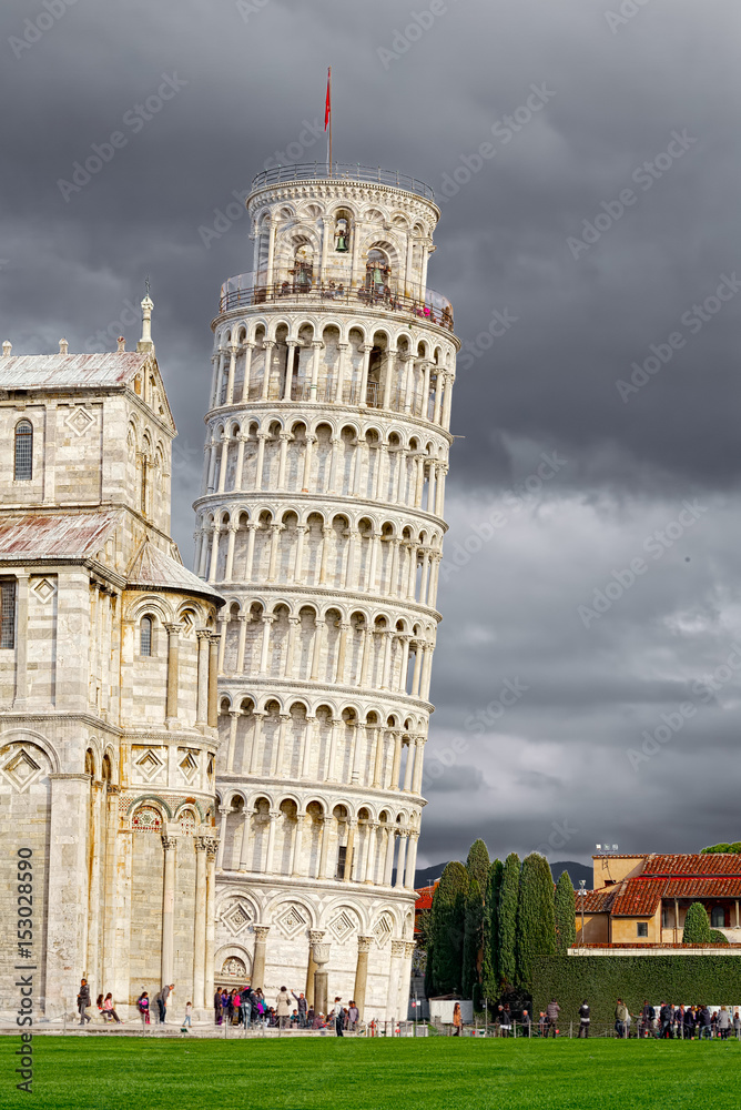 Square of Miracles and the Leaning Tower of Pisa in a stormy sky