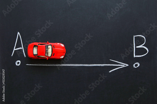 From point A to point B on the car. Drawing chalk on a black board