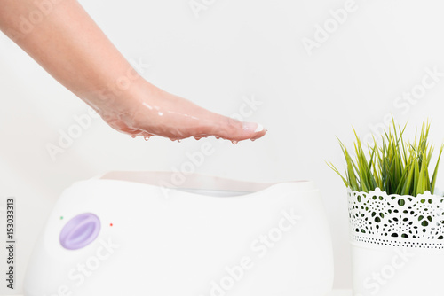 Canvas Print Hand treatment in paraffin bath