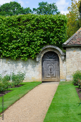 Path to gate in traditional English garden