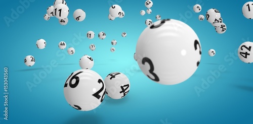 Composite image of falling lottery balls  photo