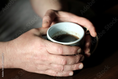 cup of coffee in hands