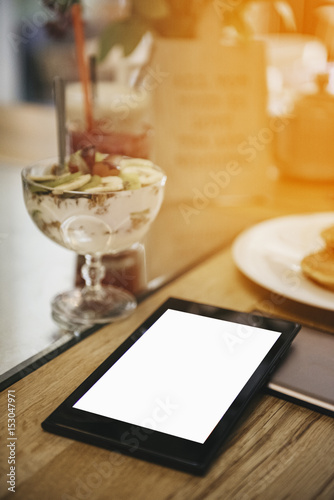 Breakfast with a tablet with copyspace