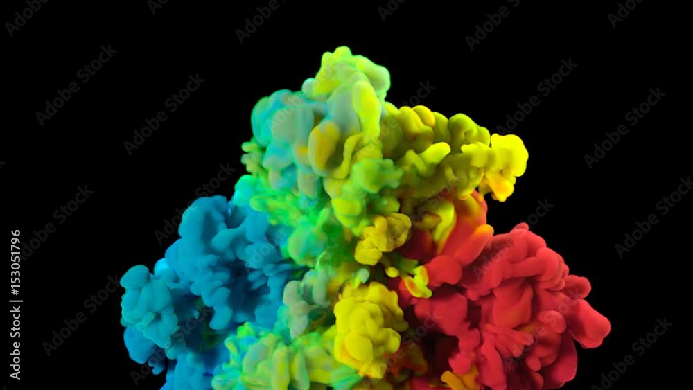 Colorful rainbow paint drops mix in water. Ink swirling underwater. Cloud of silky ink isolated on black background. Colored abstract smoke explosion animation effect. Close up view.