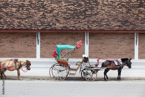 tradition horse carriage is a symbol of Lampang province. photo