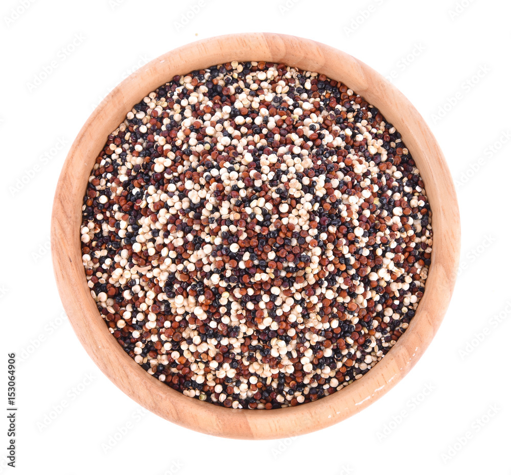 Quinoa seeds in wood bowl.Top view. Quinoa seeds in wood bowl.Top view.