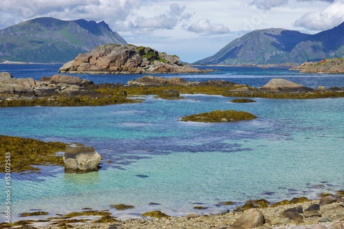 Landscape with mountains and clear water in the Lofoten Islands, Norway