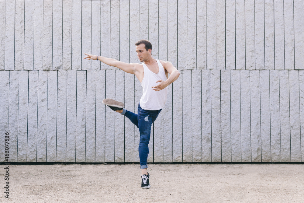 Obraz premium male ballet dancer dancing on casual clothes