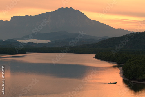 Sunrise at Mengkabong river, Sabah, Borneo, Asia photo