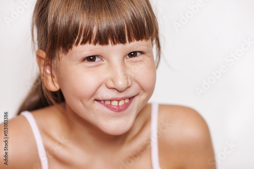 happy smiling girl wearing bangs