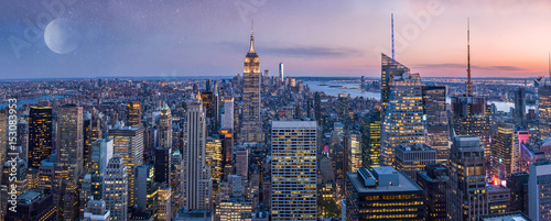Manhattan midtown skyline panorama at night time, New York, USA