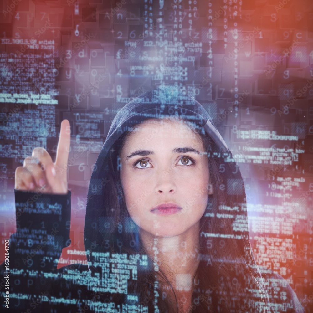 Composite image of young female hacker using digital screen Stock Photo