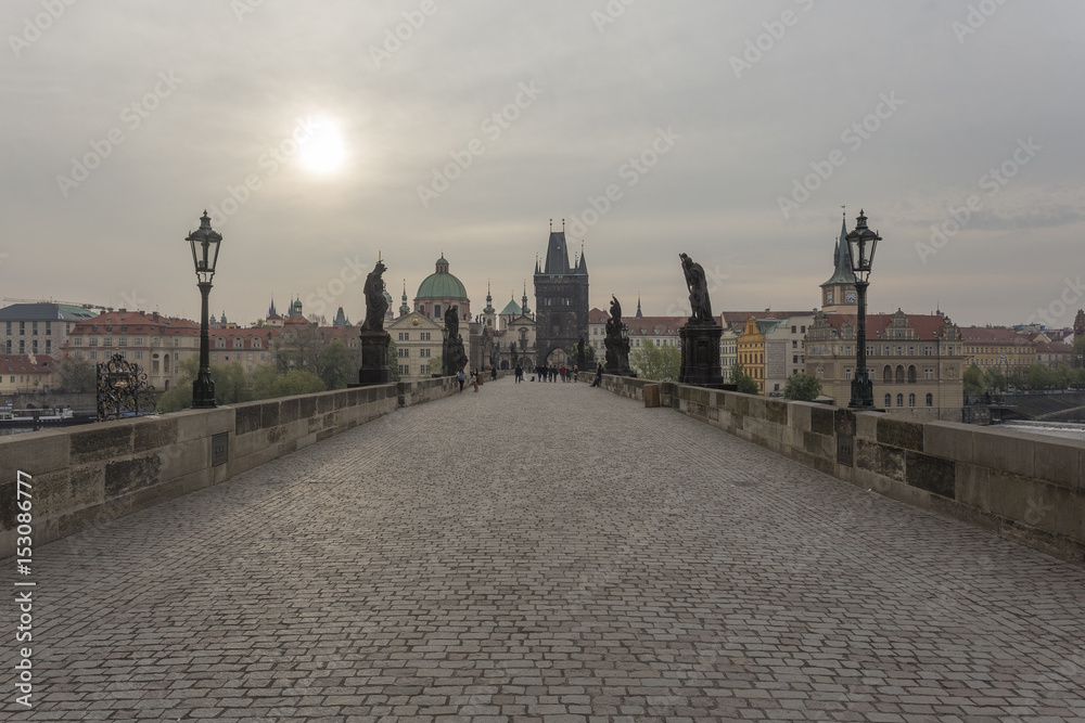 Charles Bridge in Prague. Sunrise in old town. Traveling to the Czech Republic