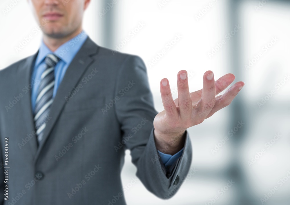 Businessman gesturing in office Businessman gesturing in office