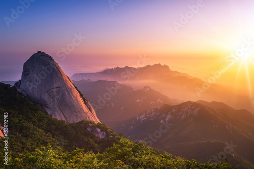mountain in korea at sunrise located in gyeonggido seoul, south korea. the name of mountain 'Bukhansan' photo