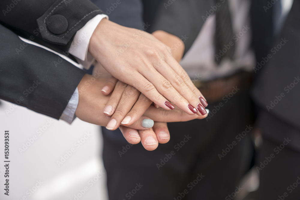  Group of business Asian people with hands together.Business concept.