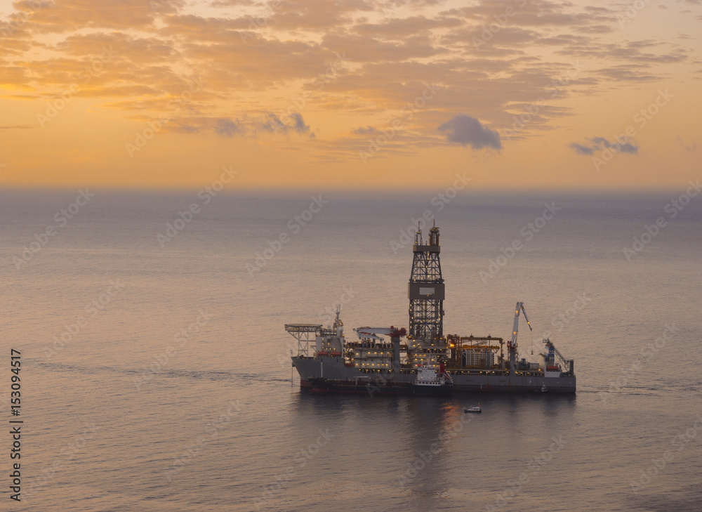Drill Ship on the ocean at sunrise