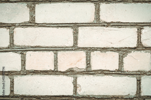 white bricklaying with cement/brick wall from a white stone