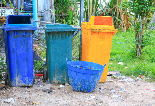 trash basket plastic blue in the city