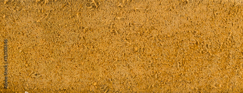 Beige suede soft leather as texture background. Old leather. Brown chamois texture. Fluffy and soft shammy-leather. Close up shammy leather texture