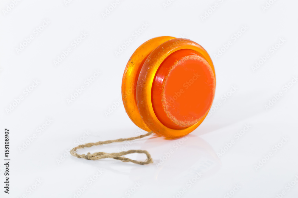 Photo Art Print old yoyo orange isolated on white background NVB Stocker