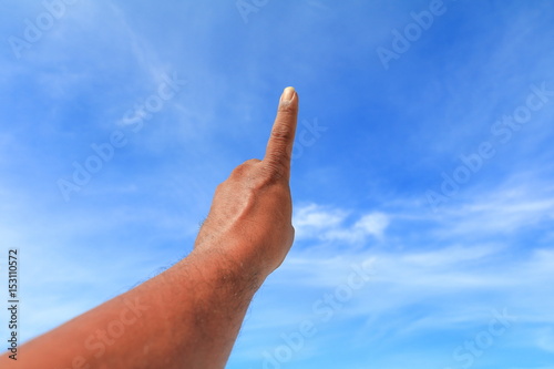 hand show counting number one on sky background