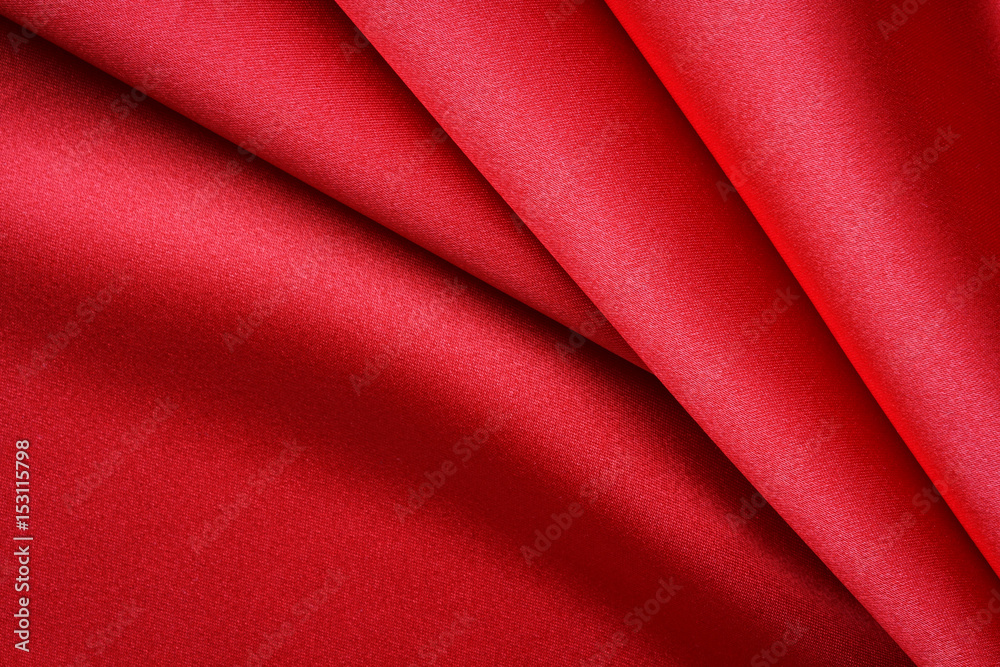 bright red satin fabric with large folds, abstract background bright red satin fabric with large folds, abstract background