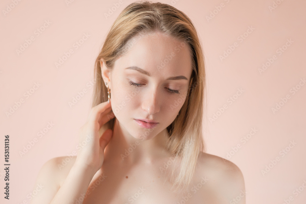 Portrait of a beautiful young woman with blue eyes. Portrait of a beautiful young woman with blue eyes.