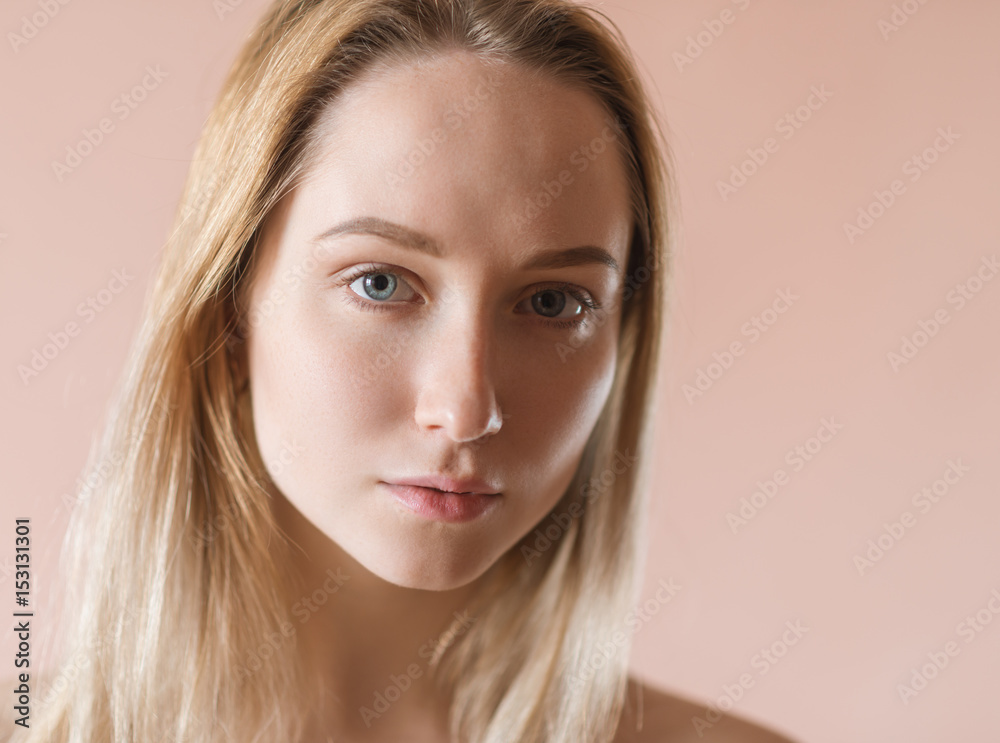 Portrait of a beautiful young woman with blue eyes. Portrait of a beautiful young woman with blue eyes.