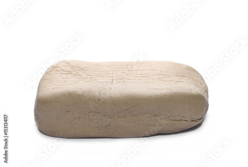 Grey modelling clay block isolated on white background