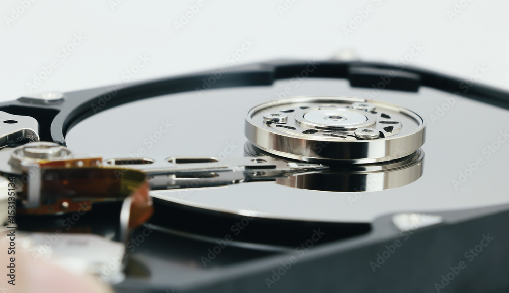 Open cover harddisk and harddisk back - harddisk drive is the data storage for the digital data where is in the your computer isolate on white Open cover harddisk and harddisk back - harddisk drive is the data storage for the digital data where is in the your computer isolate on white