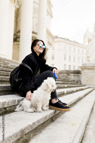 Beautiful girl sitting on s...