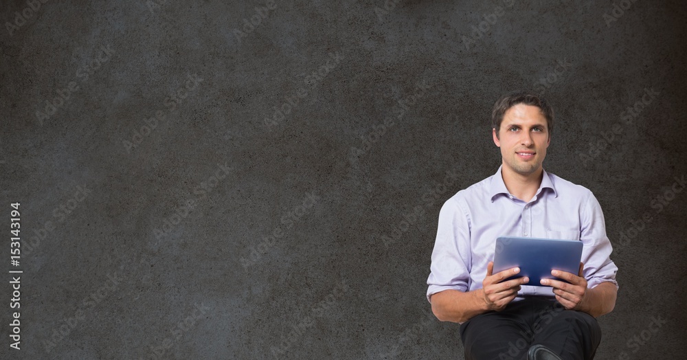 Confident businessman holding digital tablet Confident businessman holding digital tablet