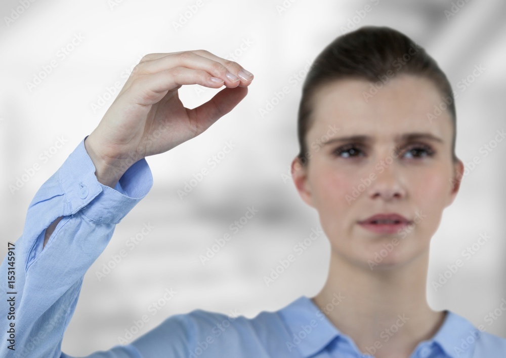 Businesswoman gesturing while looking away