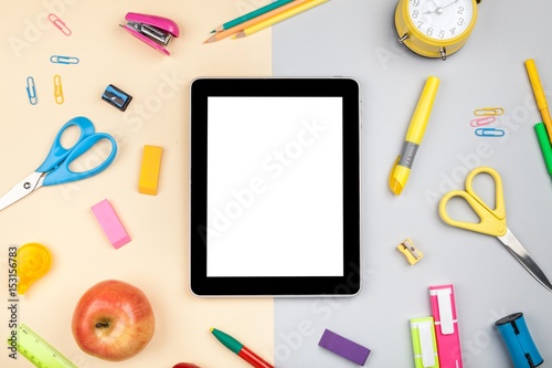 School and office supplies on tablet.