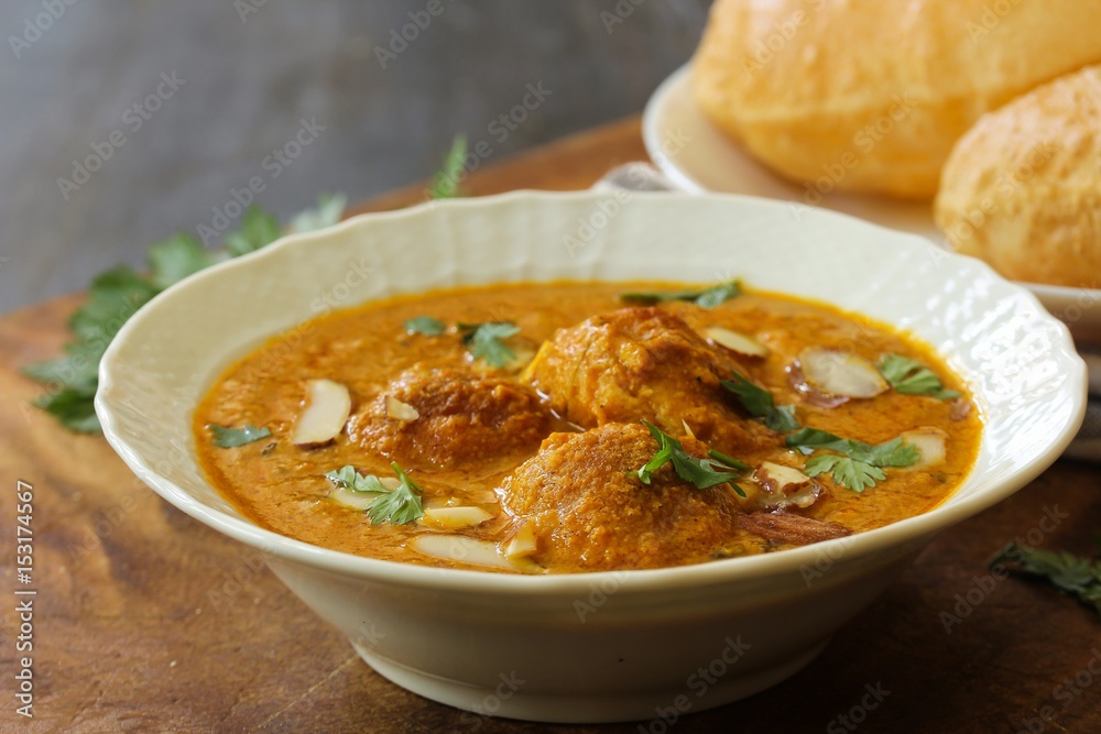 Malai Kofta - Classic north Indian dish with Paneer potato balls tossed in rich tomato cream base gravy Malai Kofta - Classic north Indian dish with Paneer potato balls tossed in rich tomato cream base gravy