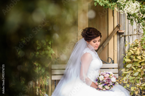 Wallpaper Mural Beauty portrait of bride wearing fashion wedding dress with feathers with luxury delight make-up and hairstyle, studio indoor photo. Young attractive multi-racial Asian Caucasian model Torontodigital.ca