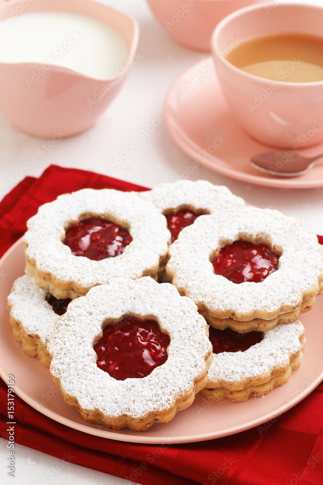 Raspberry Jam Filled Linzer Torte Cookies with Tea or Coffee Raspberry Jam Filled Linzer Torte Cookies with Tea or Coffee