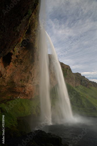 Seljalandsfoss waterfall plunging 60m from the cliff above, Sudhurland, Iceland