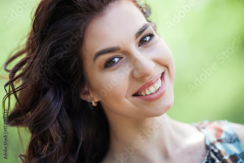 Beauty smiling model with natural make up and long eyelashes. Youth and skin care concept. Spa and wellness.