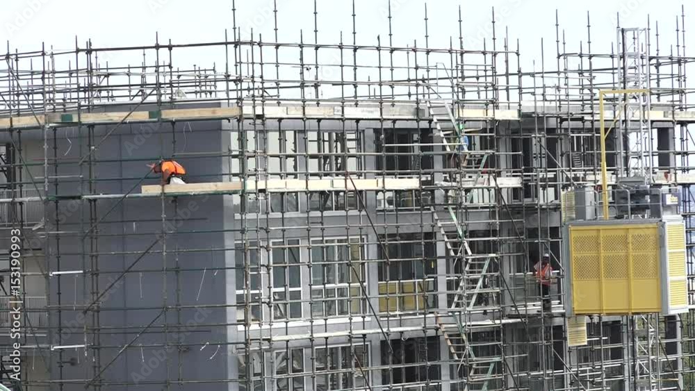 Construction workers on a scaffoldbuilding