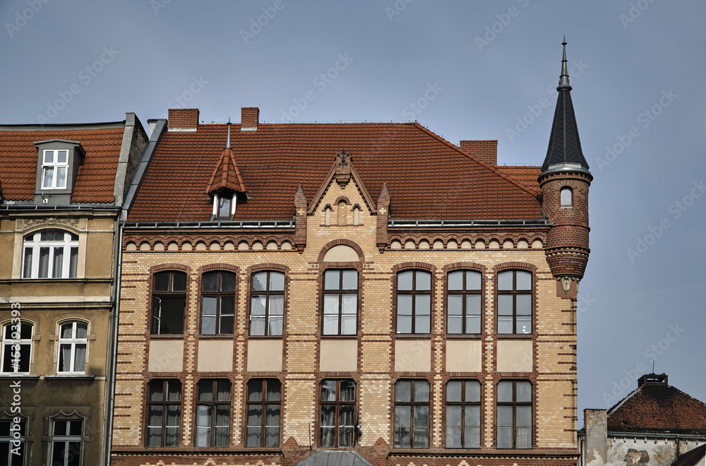 Fototapeta premium Street with historic tenement houses in Poznan.