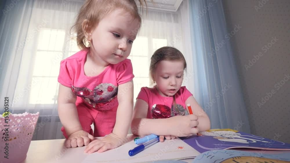 The slowmotion shooting of the drawing children. Portrait. Steadicam. Close-up. HD. The slowmotion shooting of the drawing children. Portrait. Steadicam. Close-up. HD.