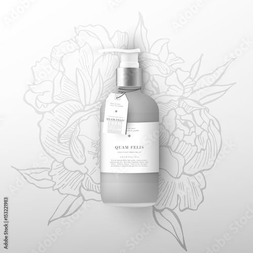 Realistic beige bottle of liquid soap. Flowers peonies background