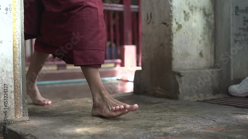 Amarapura, monk feet passing by photo