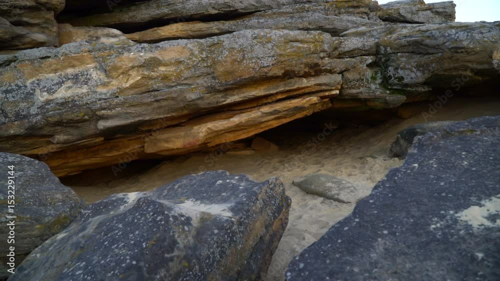A mysterious cave under a heap of sandstone in a place called stone tombs