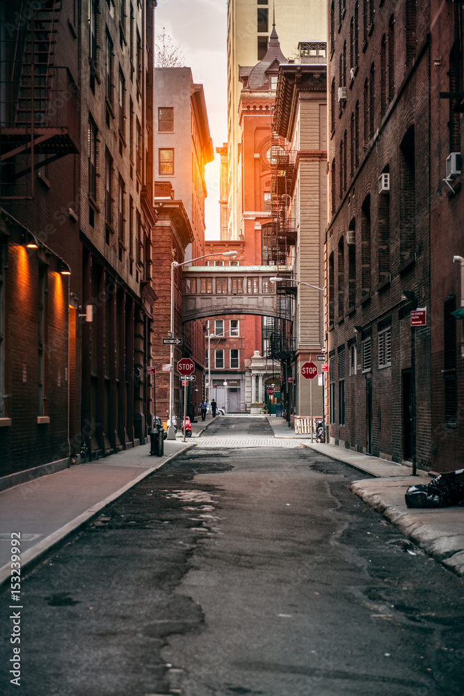 Red bricks building at New York City street at sunset time.