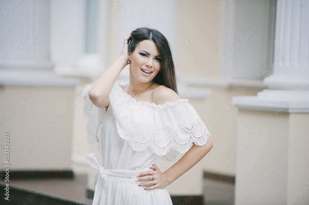 brunette in a dress brunette in a dress