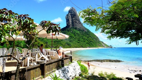 Chilling around in praia Conceio, on of the best beaches in Fernando Noronha, Brazil photo