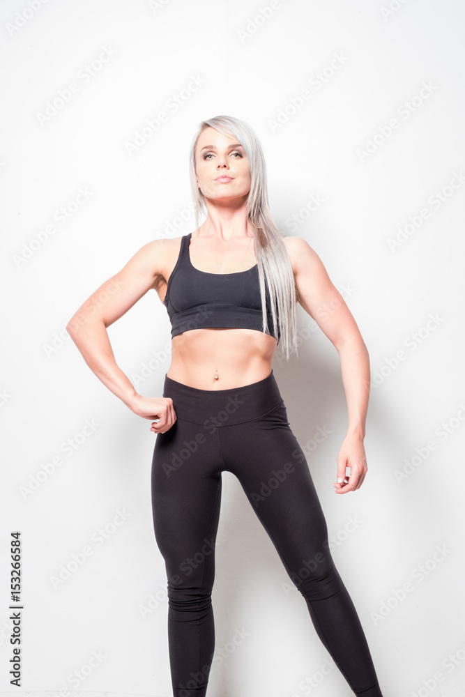 isolated studio shoot of an athletic looking blonde female isolated studio shoot of an athletic looking blonde female